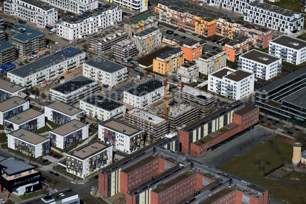 Berlin from the bird's eye view: Construction site to build a new multi-family residential complex on Abram-Joffe-Strasse in the district Adlershof in Berlin