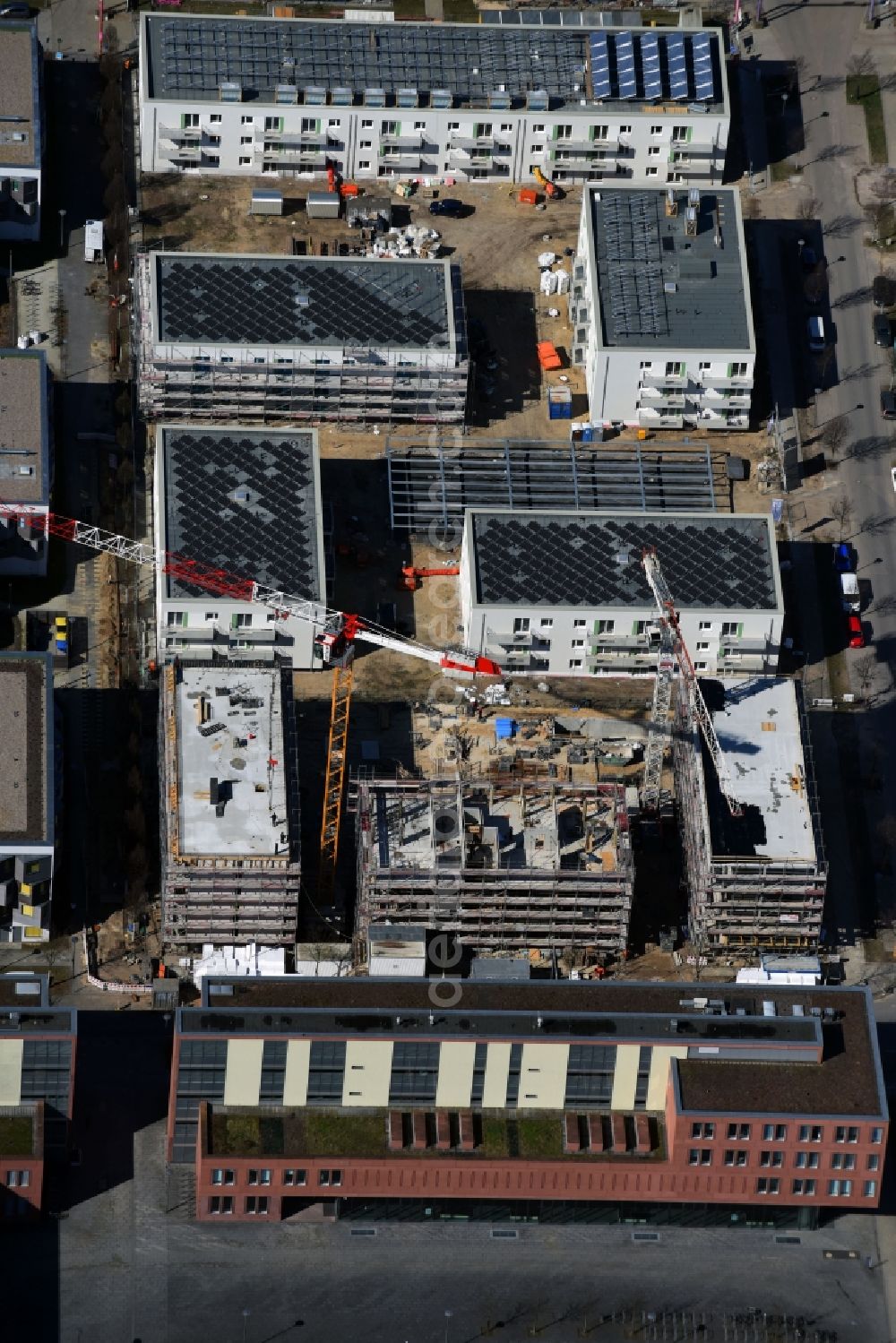 Berlin from above - Construction site to build a new multi-family residential complex on Abram-Joffe-Strasse in the district Adlershof in Berlin