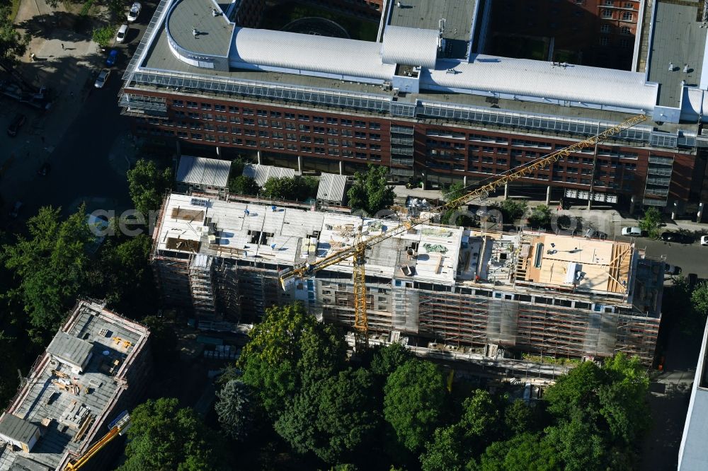 Berlin from the bird's eye view: Construction site to build a new multi-family residential complex of ACCENTRO GmbH on Lange Strasse in Berlin, Germany