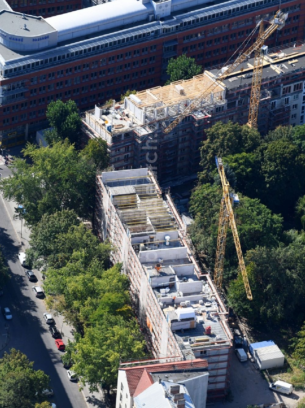 Berlin from the bird's eye view: Construction site to build a new multi-family residential complex of ACCENTRO GmbH on Lange Strasse in Berlin, Germany