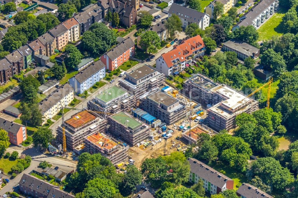 Herne from the bird's eye view: Construction site to build a new multi-family residential complex Albert-Schweitzer-Carre on Fritz-Reuter-Strasse - Eichendorffstrasse in Herne in the state North Rhine-Westphalia, Germany