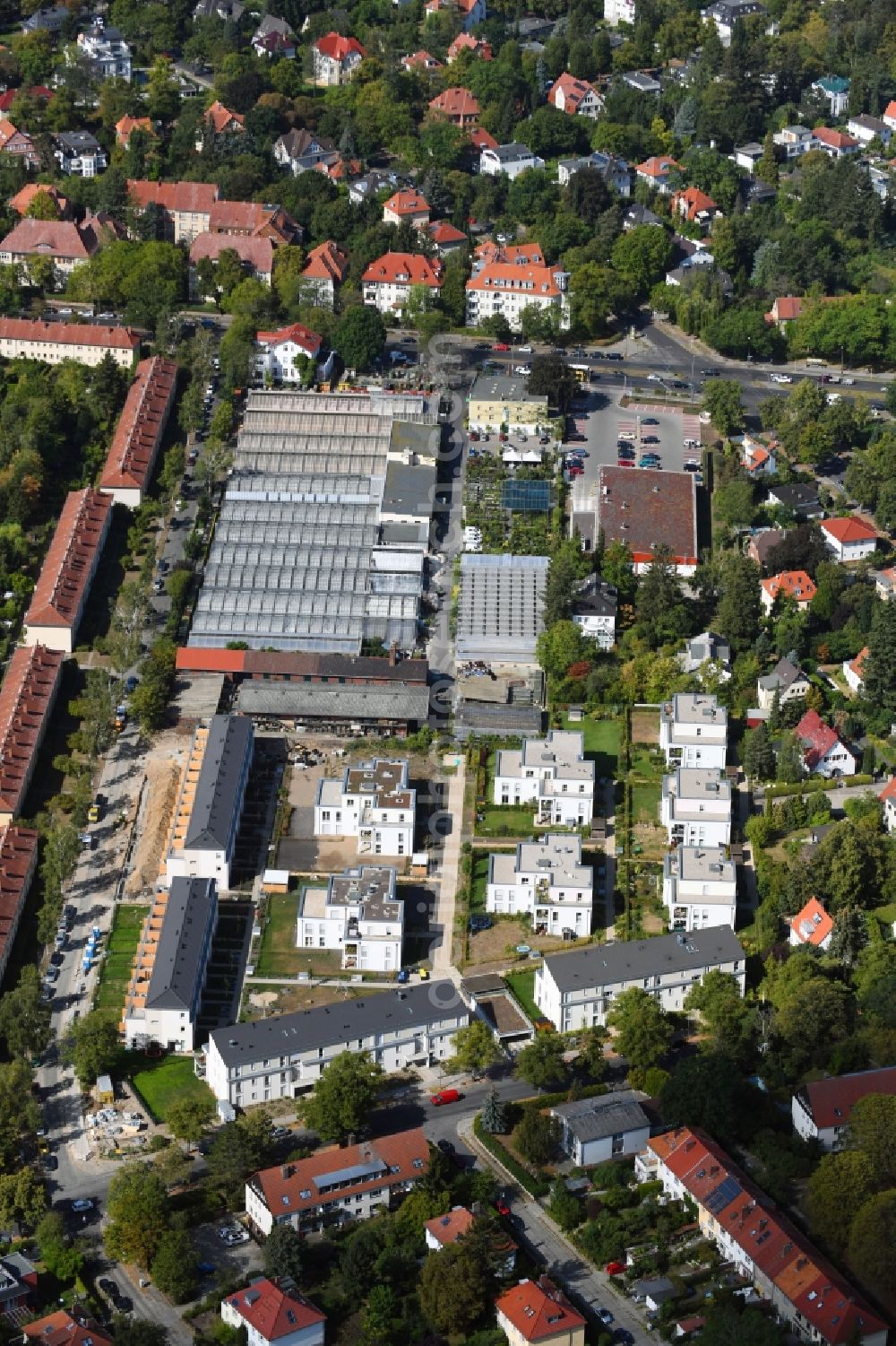 Berlin from the bird's eye view: Construction site to build a new multi-family residential complex ALTE GAeRTNEREI of PROJECT Immobilien Wohnen AG on Sundgauer Strasse corner Schlettstadter Strasse in Berlin, Germany