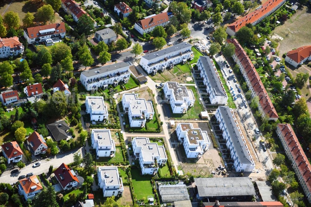 Berlin from the bird's eye view: Construction site to build a new multi-family residential complex ALTE GAeRTNEREI of PROJECT Immobilien Wohnen AG on Sundgauer Strasse corner Schlettstadter Strasse in Berlin, Germany