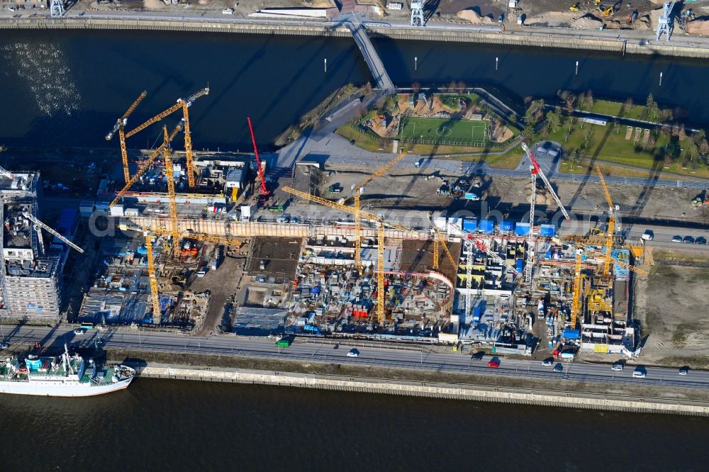 Aerial image Hamburg - Construction site to build a new multi-family residential complex on Baakenallee in the district HafenCity in Hamburg, Germany