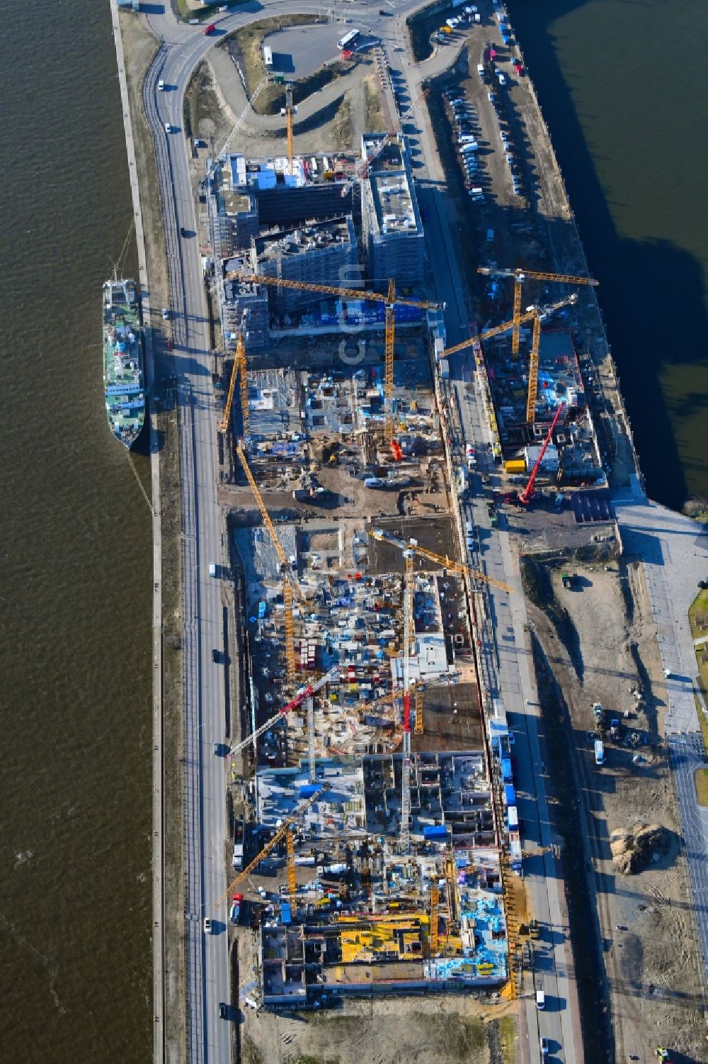 Hamburg from above - Construction site to build a new multi-family residential complex on Baakenallee in the district HafenCity in Hamburg, Germany