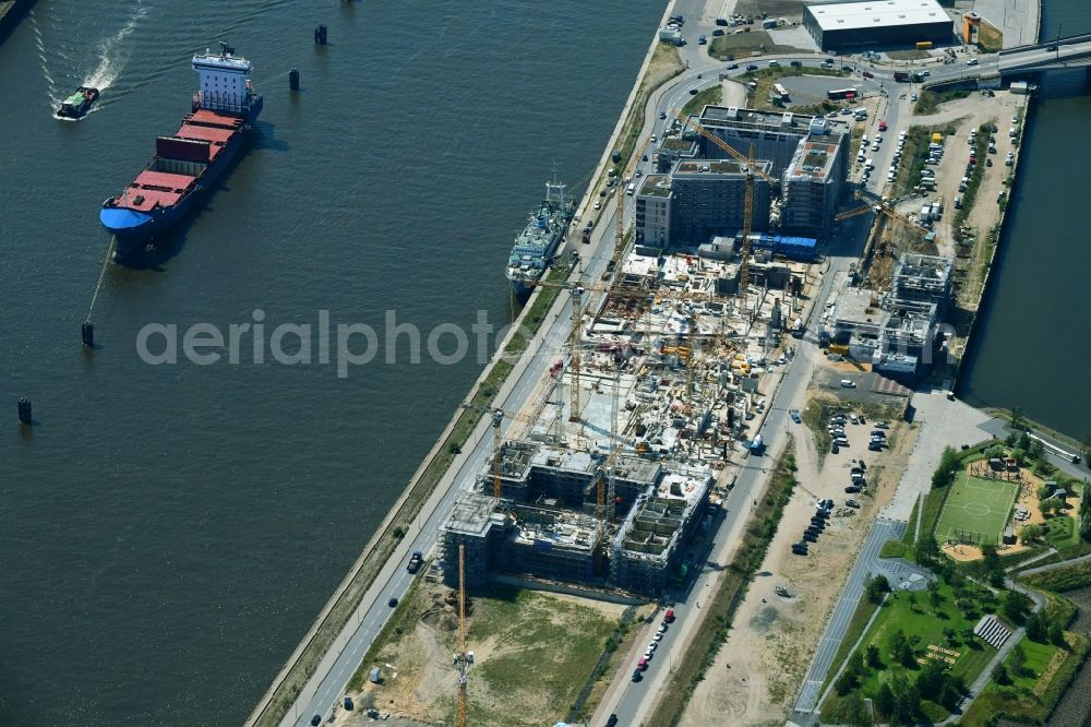 Aerial photograph Hamburg - Construction site to build a new multi-family residential complex on Baakenallee in the district HafenCity in Hamburg, Germany