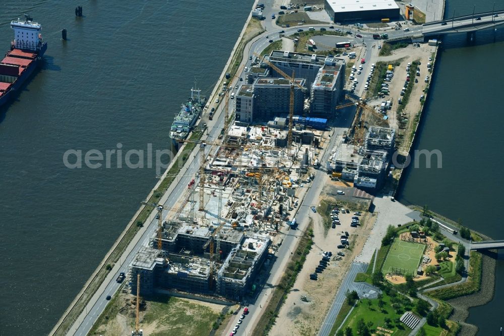 Hamburg from above - Construction site to build a new multi-family residential complex on Baakenallee in the district HafenCity in Hamburg, Germany