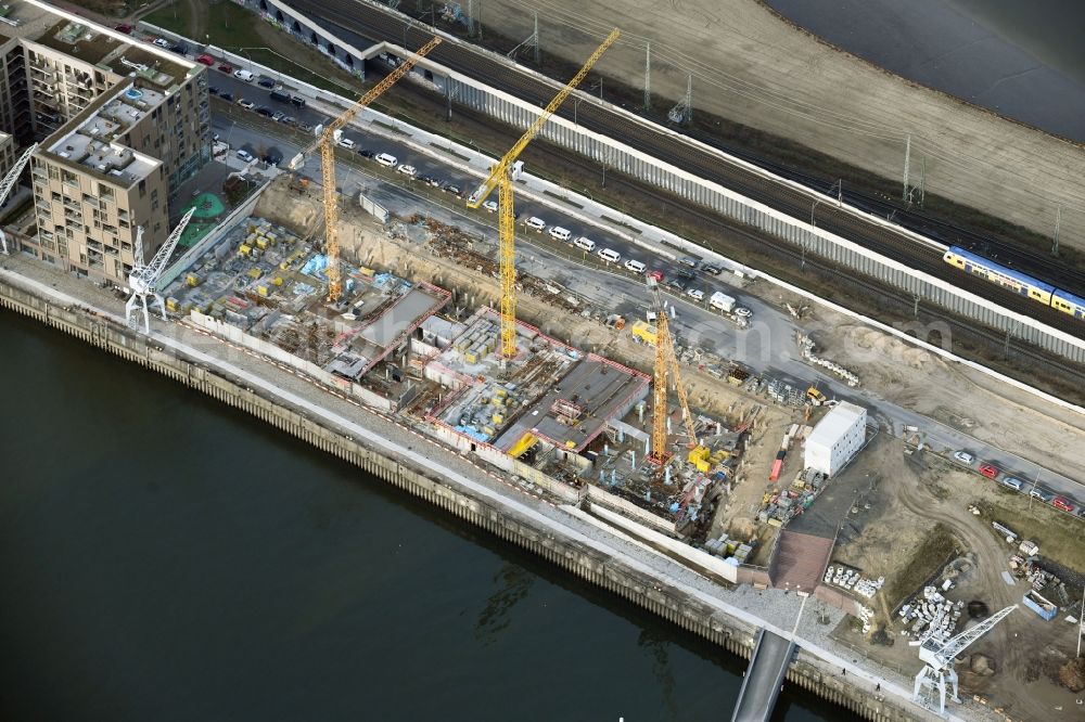 Hamburg from above - Construction site to build a new multi-family residential complex on Baakenallee in the district HafenCity in Hamburg, Germany