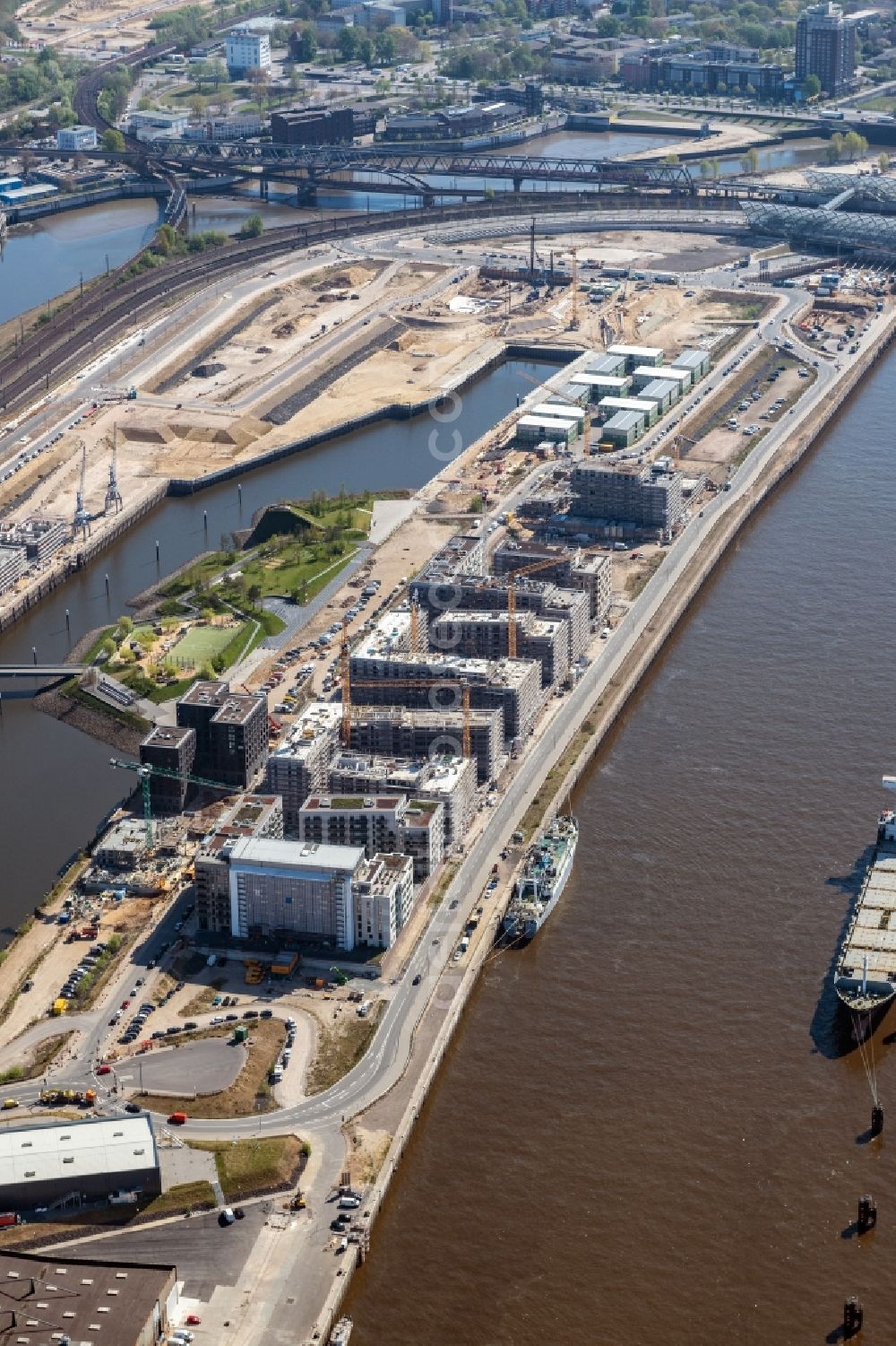 Hamburg from above - Construction site to build a new multi-family residential complex on Baakenallee in the district HafenCity in Hamburg, Germany