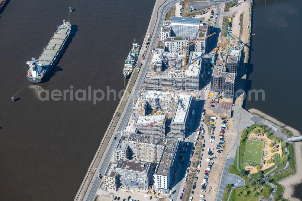 Hamburg from above - Construction site to build a new multi-family residential complex on Baakenallee in the district HafenCity in Hamburg, Germany