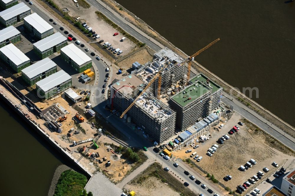 Aerial image Hamburg - Construction site to build a new multi-family residential complex on Baakenallee in the district HafenCity in Hamburg, Germany