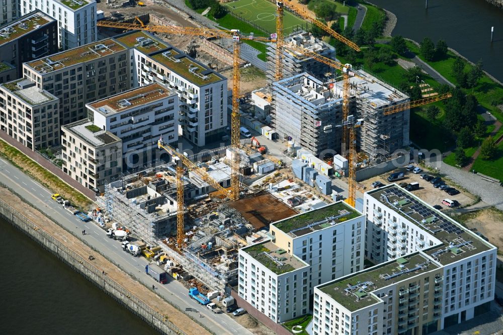 Hamburg from above - Construction site to build a new multi-family residential complex on Baakenhafen Baufeld 99 along the Baakenallee in the district HafenCity in Hamburg, Germany