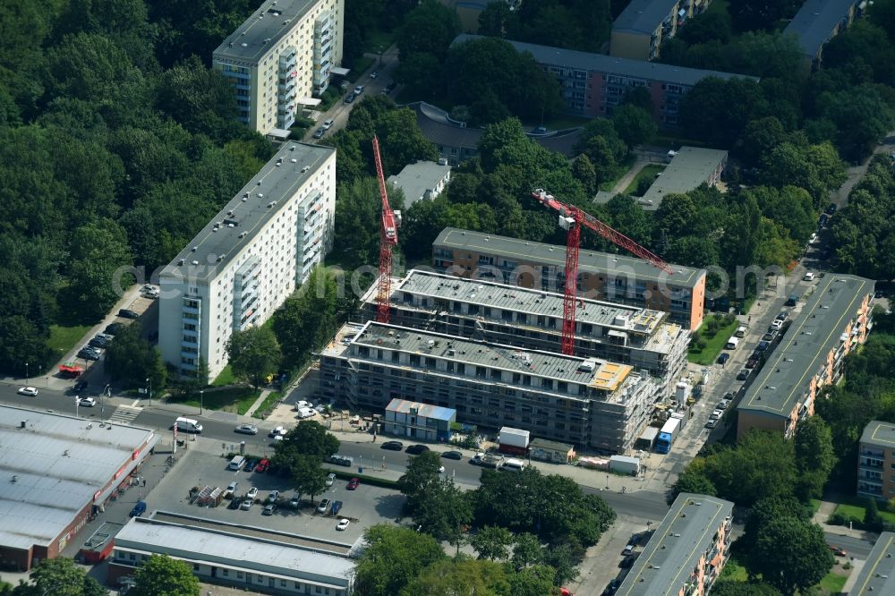 Berlin from the bird's eye view: Construction site to build a new multi-family residential complex Balatonstrasse Ecke Volkradstrasse in the district Friedrichsfelde in Berlin