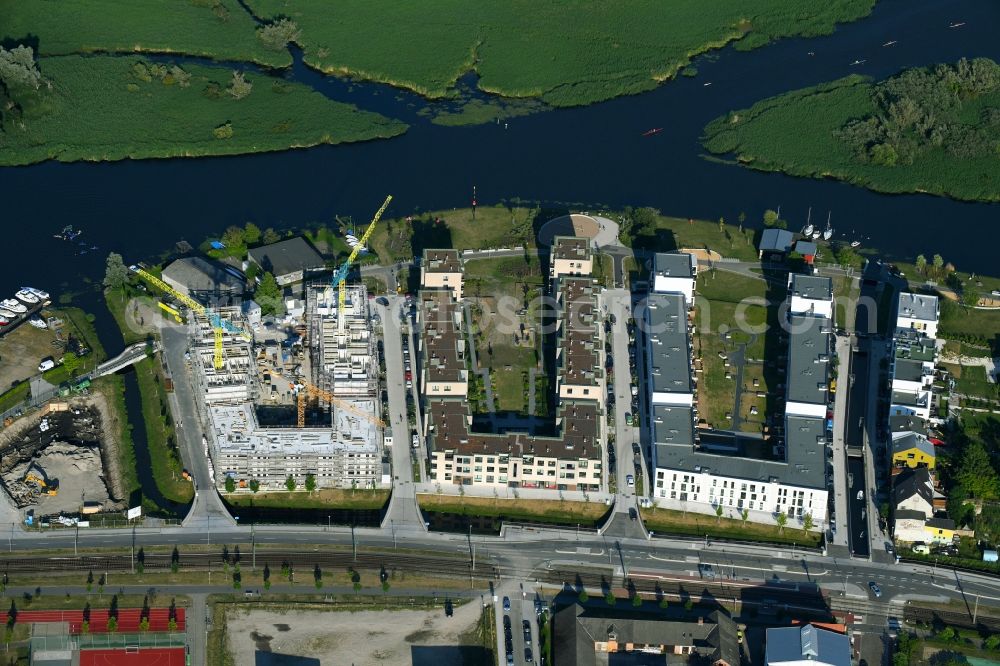 Rostock from above - Construction site to build a new multi-family residential complex of Baugenossenschaft Neptun e.G. Am Haargraben - Beim Holzlager in Rostock in the state Mecklenburg - Western Pomerania, Germany