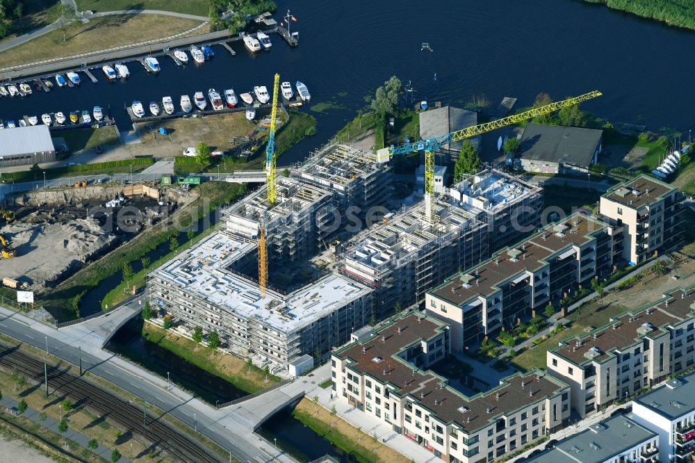 Aerial photograph Rostock - Construction site to build a new multi-family residential complex of Baugenossenschaft Neptun e.G. Am Haargraben - Beim Holzlager in Rostock in the state Mecklenburg - Western Pomerania, Germany