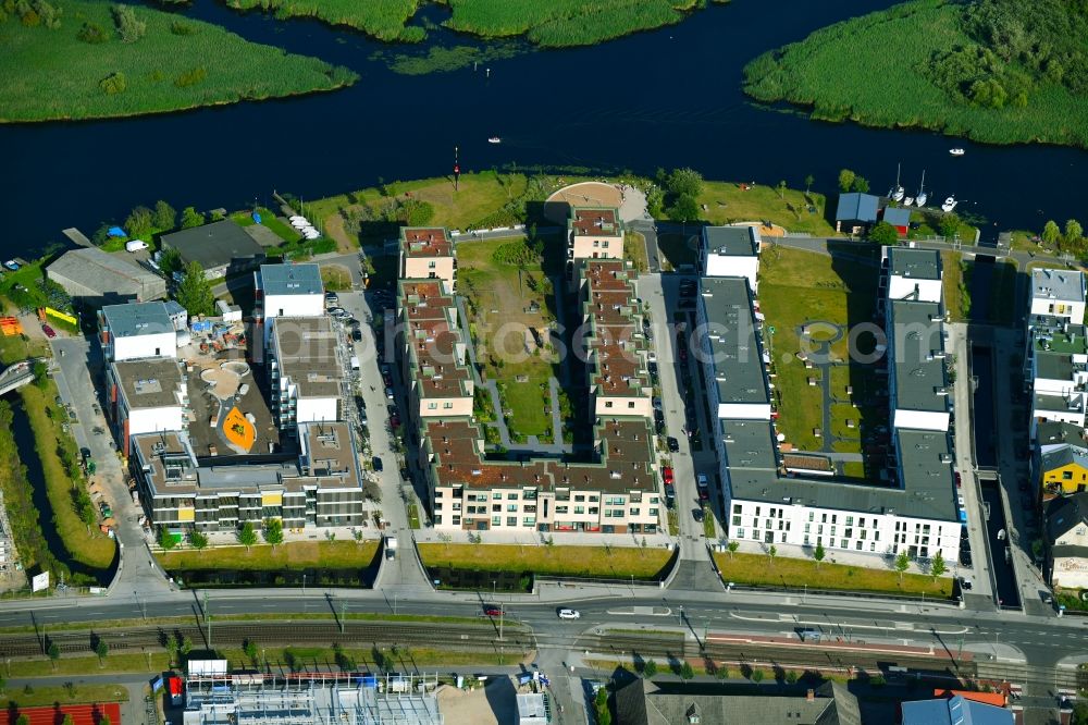 Rostock from above - Construction site to build a new multi-family residential complex of Baugenossenschaft Neptun e.G. Am Haargraben - Beim Holzlager in Rostock in the state Mecklenburg - Western Pomerania, Germany