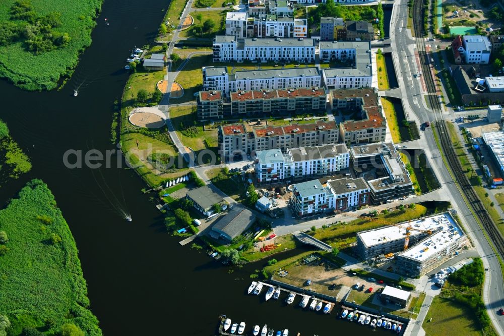 Rostock from above - Construction site to build a new multi-family residential complex of Baugenossenschaft Neptun e.G. Am Haargraben - Beim Holzlager in Rostock in the state Mecklenburg - Western Pomerania, Germany