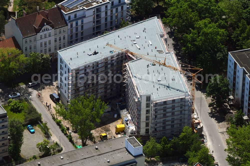 Berlin from above - Construction site to build a new multi-family residential complex of Belle Epoque Gesellschaft fuer behutsame Stadterneuerung mbH on Alfred-Kowalke-Strasse - Charlottenstrasse in Berlin, Germany