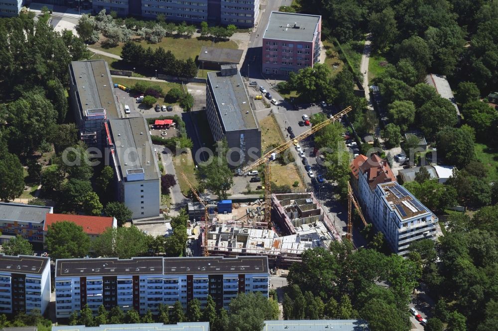 Aerial photograph Berlin - Construction site to build a new multi-family residential complex of Belle Epoque Gesellschaft fuer behutsame Stadterneuerung mbH on Alfred-Kowalke-Strasse - Charlottenstrasse in the disrict Friedrichsfelde in Berlin, Germany