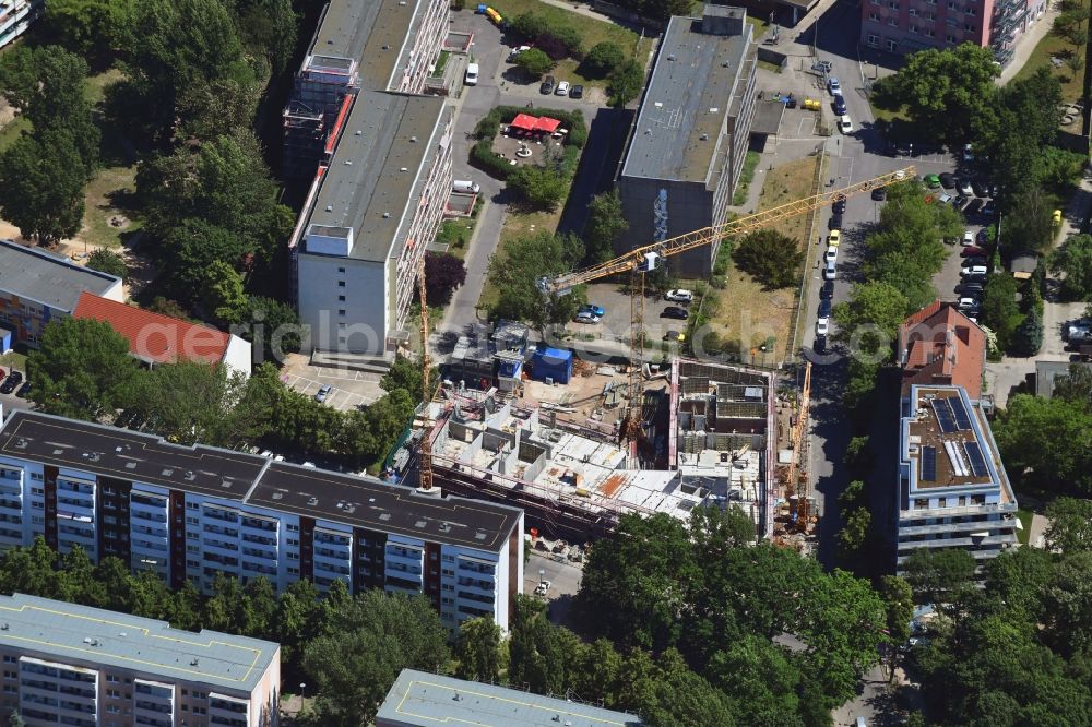 Berlin from above - Construction site to build a new multi-family residential complex of Belle Epoque Gesellschaft fuer behutsame Stadterneuerung mbH on Alfred-Kowalke-Strasse - Charlottenstrasse in the disrict Friedrichsfelde in Berlin, Germany