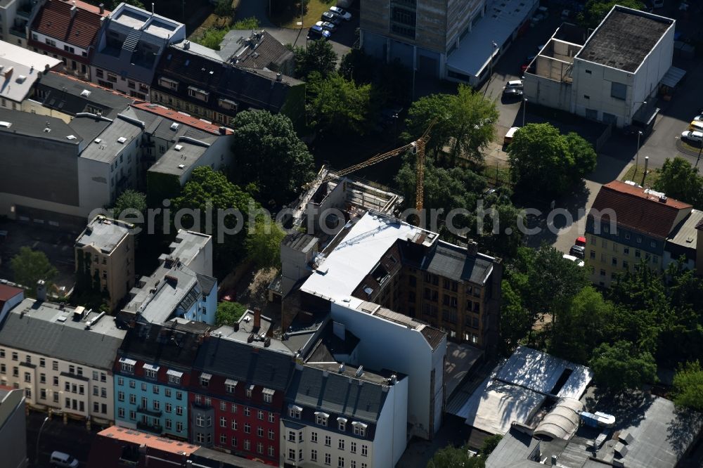 Berlin from above - Construction site to build a new multi-family residential complex in the Bruecken street in Berlin