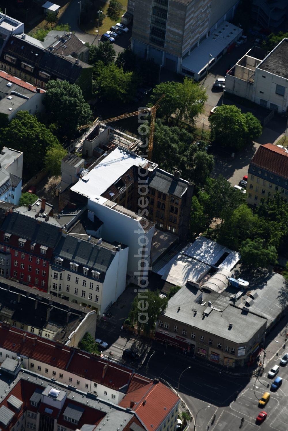 Berlin from the bird's eye view: Construction site to build a new multi-family residential complex in the Bruecken street in Berlin