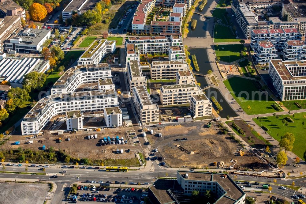 Essen from the bird's eye view: Construction site to build a new multi-family residential complex am Berliner Platz in der Gruenen Mitte in Essen in the state North Rhine-Westphalia