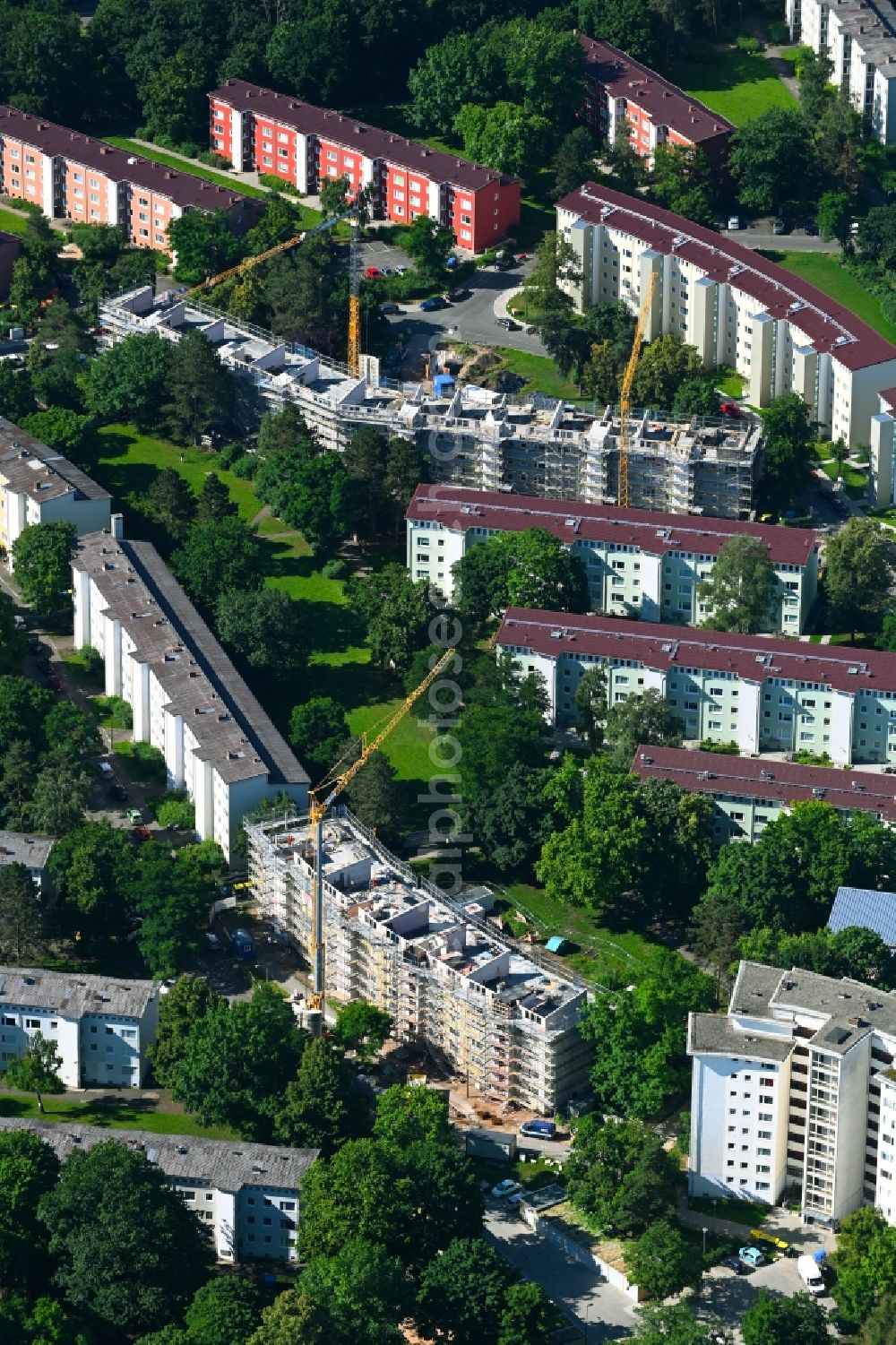 Nürnberg from the bird's eye view: Construction site to build a new multi-family residential complex on Bernadottestrasse - Nansenstrasse - Ossietzkystrasse in the district Suendersbuehl in Nuremberg in the state Bavaria, Germany