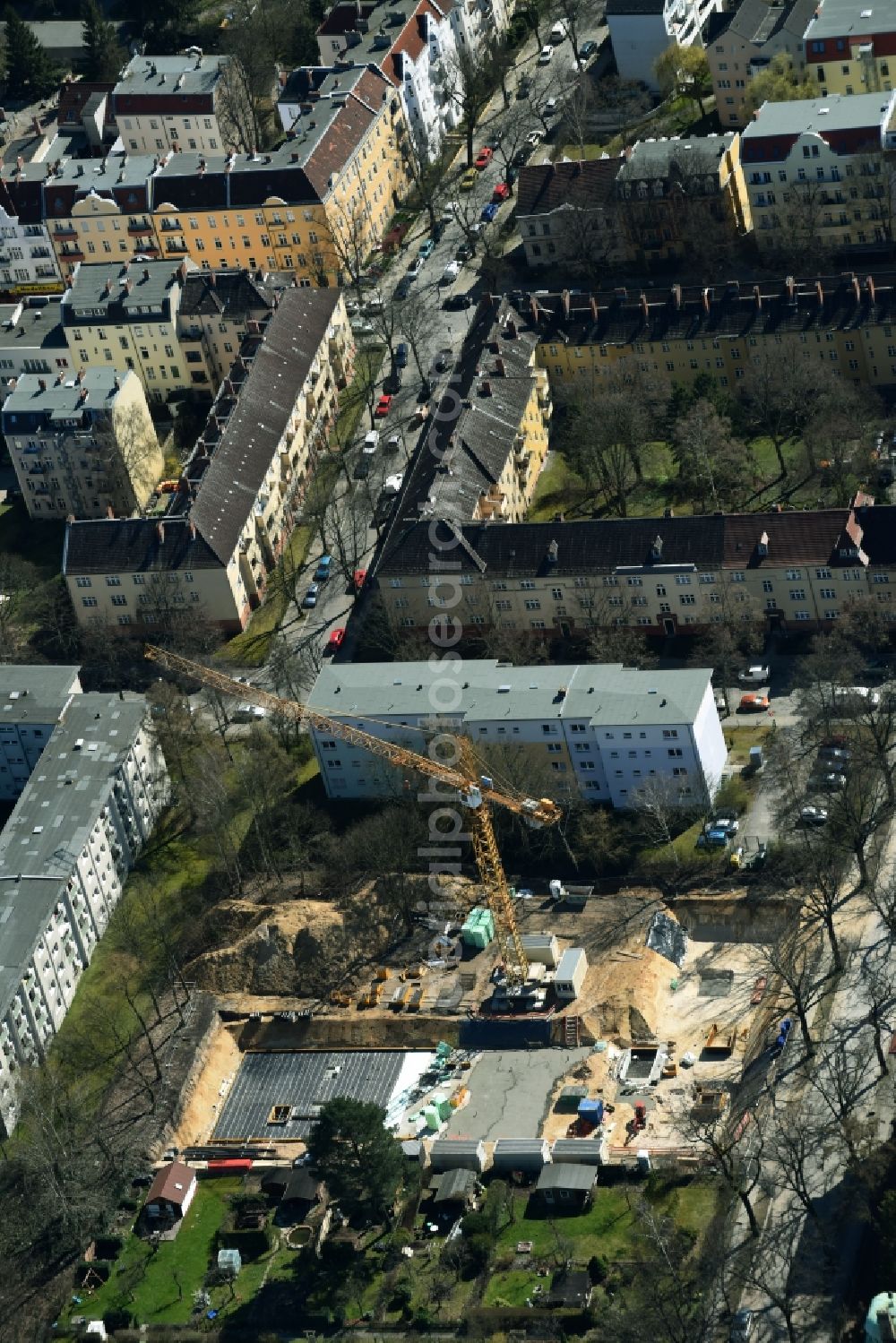 Berlin from the bird's eye view: Construction site to build a new multi-family residential complex of Bilfinger SE on Prinzenstrasse - Kueterstrasse destrict Mariendorf in Berlin in Germany