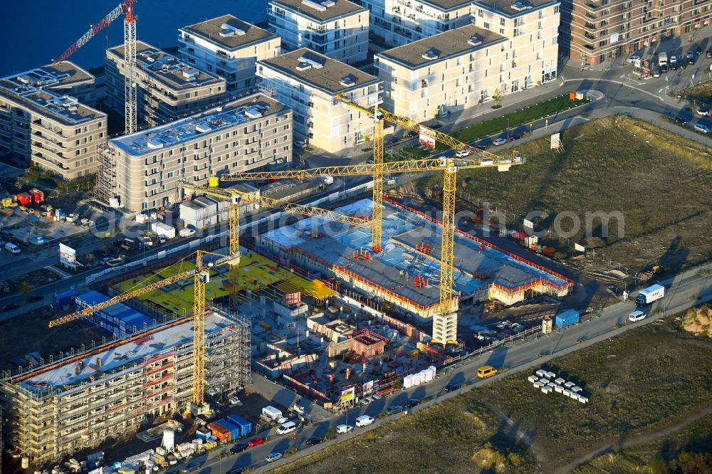 Bremen from the bird's eye view: Construction site to build a new multi-family residential complex BlauHaus of GEWOBA on Herzogin-Cecilie-Allee in Bremen, Germany