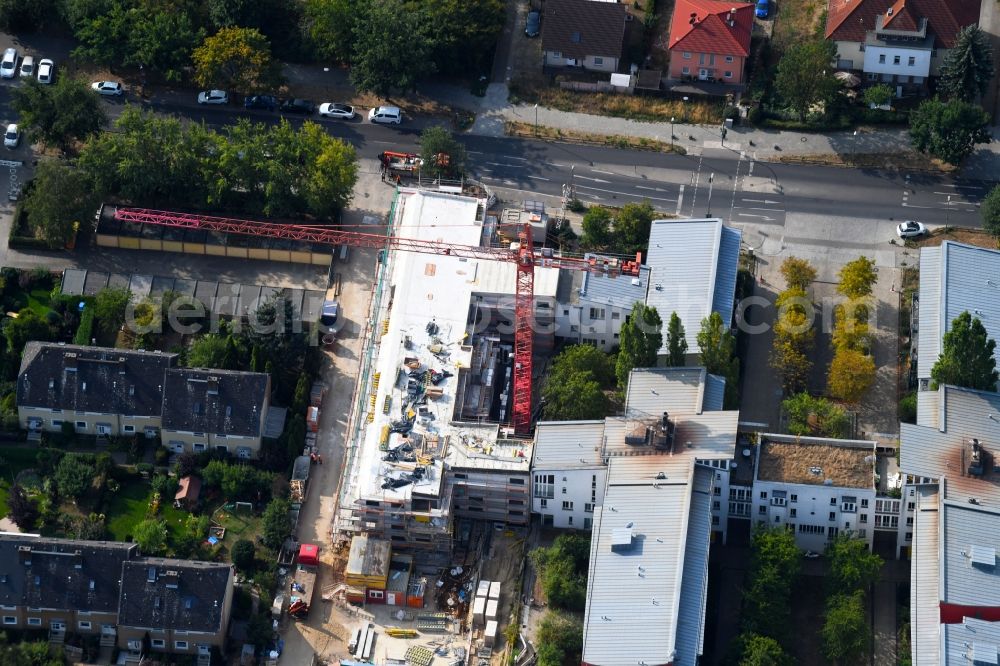 Berlin from the bird's eye view: Construction site to build a new multi-family residential complex Britzer Strasse in the district Mariendorf in Berlin, Germany