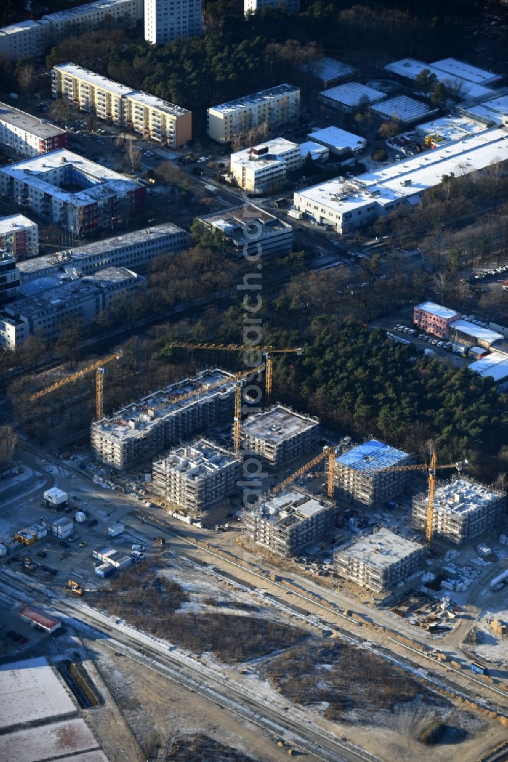 Potsdam from above - Construction site to build a new multi-family residential complex at Heinrich-Mann-Avenue in the district Waldstadt I in Potsdam in the state Brandenburg. Involved company is Heinrich-Mann-Allee 95 Grundstuecksgesellschaft mbH