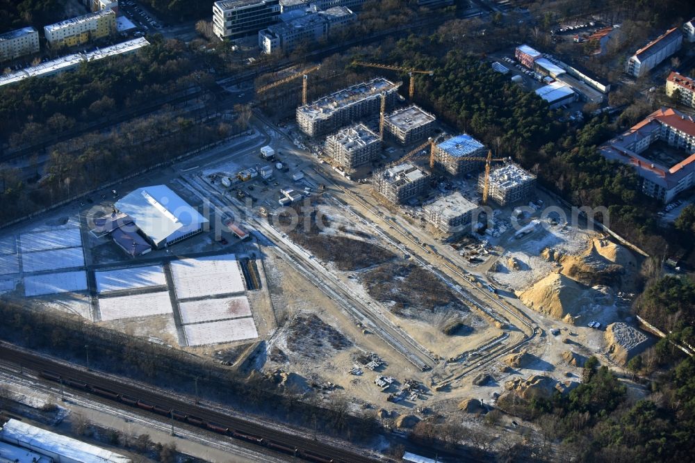 Potsdam from the bird's eye view: Construction site to build a new multi-family residential complex at Heinrich-Mann-Avenue in the district Waldstadt I in Potsdam in the state Brandenburg. Involved company is Heinrich-Mann-Allee 95 Grundstuecksgesellschaft mbH