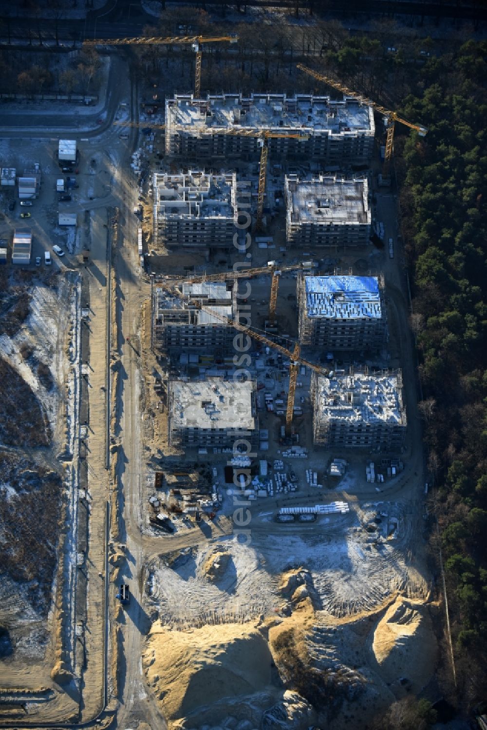 Potsdam from above - Construction site to build a new multi-family residential complex at Heinrich-Mann-Avenue in the district Waldstadt I in Potsdam in the state Brandenburg. Involved company is Heinrich-Mann-Allee 95 Grundstuecksgesellschaft mbH