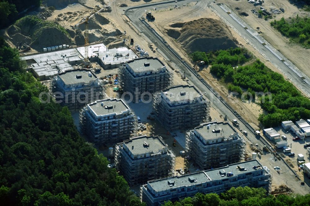 Aerial photograph Potsdam - Construction site to build a new multi-family residential complex at Heinrich-Mann-Avenue in the district Waldstadt I in Potsdam in the state Brandenburg. Involved company is Heinrich-Mann-Allee 95 Grundstuecksgesellschaft mbH