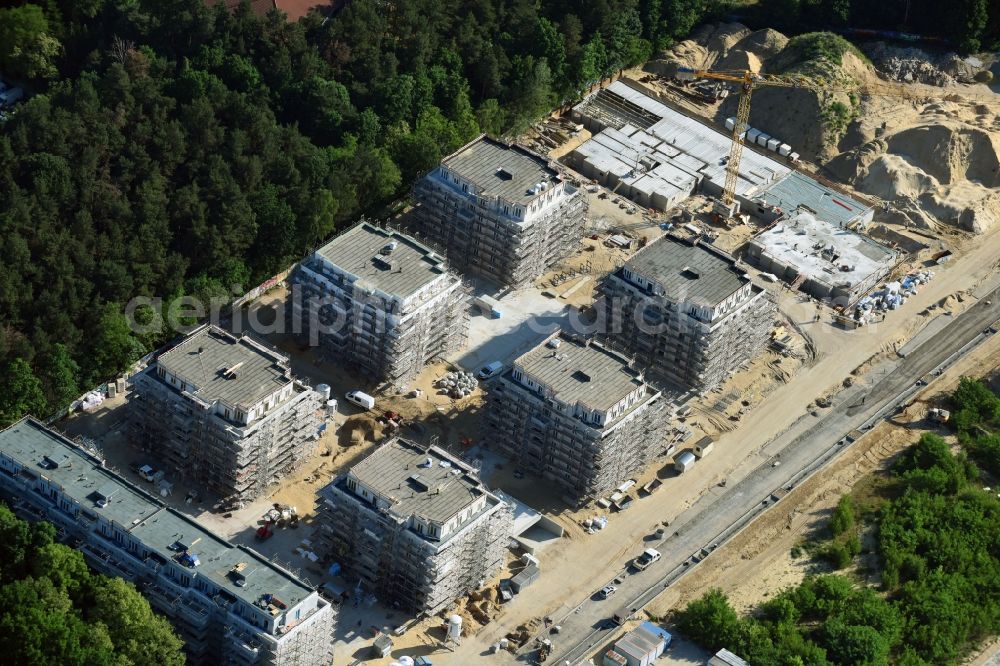 Potsdam from above - Construction site to build a new multi-family residential complex at Heinrich-Mann-Avenue in the district Waldstadt I in Potsdam in the state Brandenburg. Involved company is Heinrich-Mann-Allee 95 Grundstuecksgesellschaft mbH