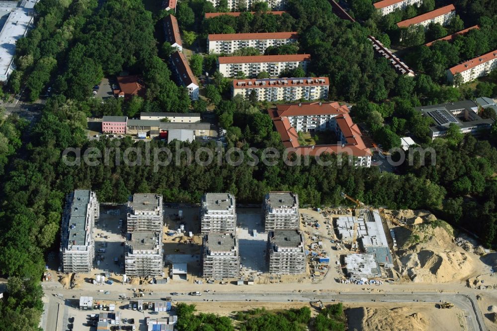 Potsdam from above - Construction site to build a new multi-family residential complex at Heinrich-Mann-Avenue in the district Waldstadt I in Potsdam in the state Brandenburg. Involved company is Heinrich-Mann-Allee 95 Grundstuecksgesellschaft mbH