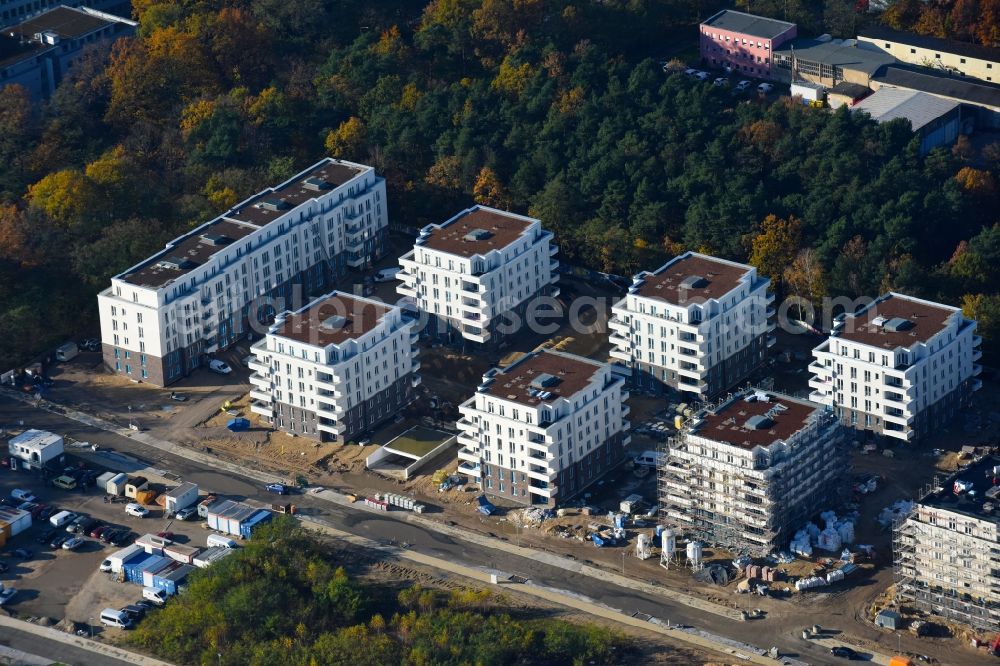 Potsdam from above - Construction site to build a new multi-family residential complex at Heinrich-Mann-Avenue in the district Waldstadt I in Potsdam in the state Brandenburg. Involved company is Heinrich-Mann-Allee 95 Grundstuecksgesellschaft mbH