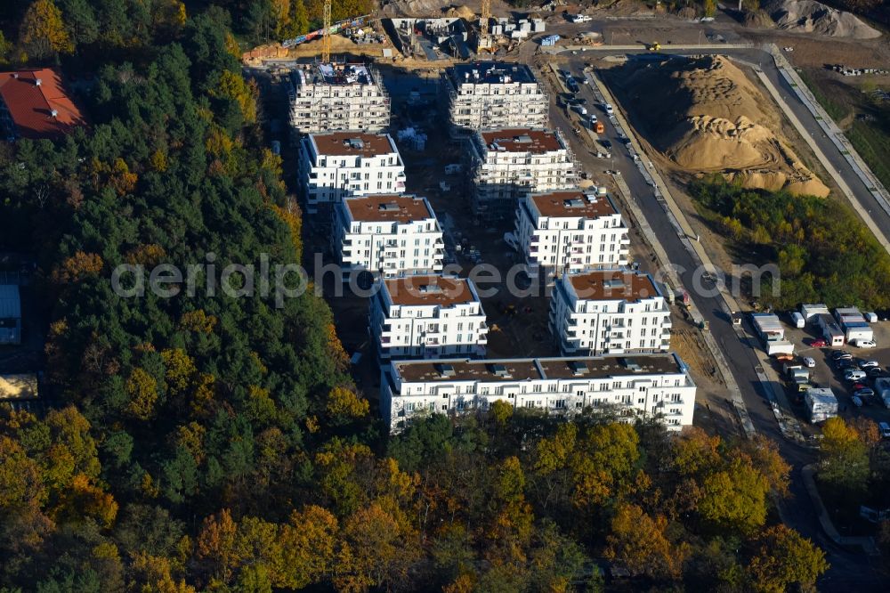 Potsdam from above - Construction site to build a new multi-family residential complex at Heinrich-Mann-Avenue in the district Waldstadt I in Potsdam in the state Brandenburg. Involved company is Heinrich-Mann-Allee 95 Grundstuecksgesellschaft mbH