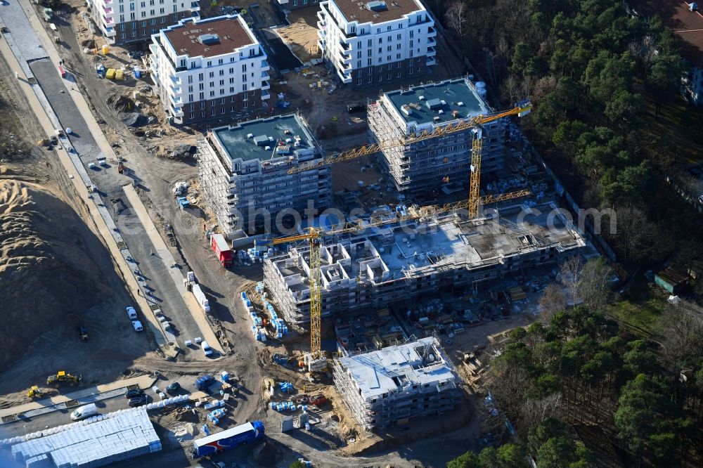 Potsdam from above - Construction site to build a new multi-family residential complex at Heinrich-Mann-Avenue in the district Waldstadt I in Potsdam in the state Brandenburg. Involved company is Heinrich-Mann-Allee 95 Grundstuecksgesellschaft mbH