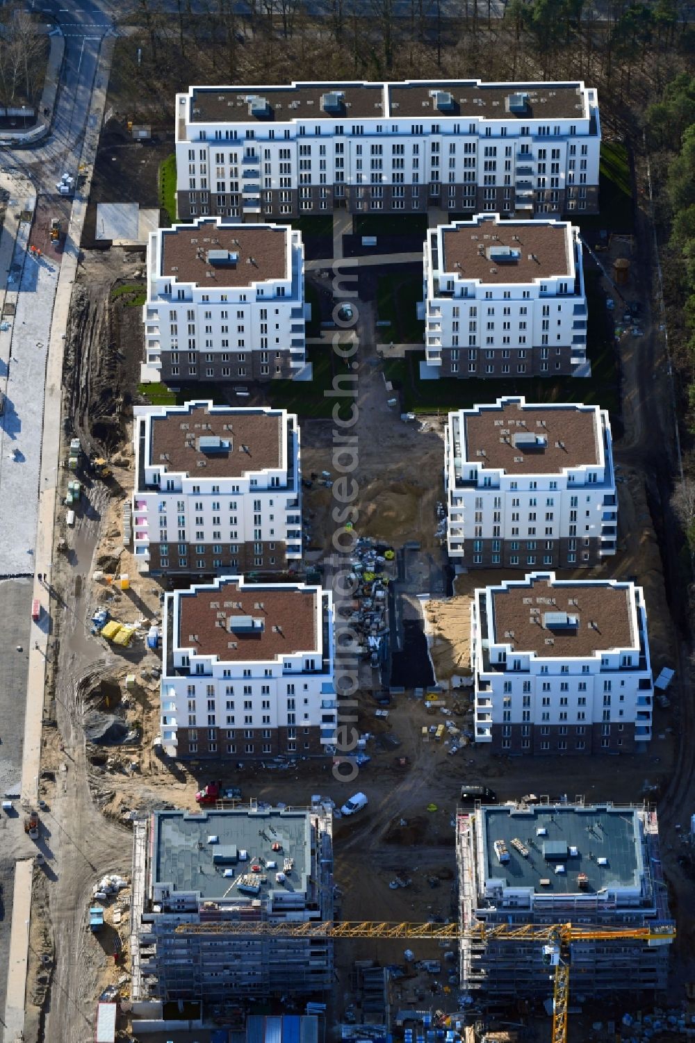 Potsdam from the bird's eye view: Construction site to build a new multi-family residential complex at Heinrich-Mann-Avenue in the district Waldstadt I in Potsdam in the state Brandenburg. Involved company is Heinrich-Mann-Allee 95 Grundstuecksgesellschaft mbH