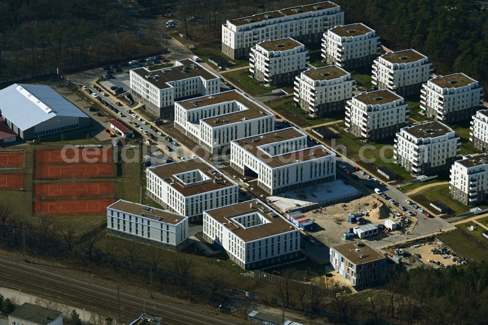 Potsdam from the bird's eye view: Construction site to build a new multi-family residential complex at Heinrich-Mann-Avenue in the district Waldstadt I in Potsdam in the state Brandenburg. Involved company is Heinrich-Mann-Allee 95 Grundstuecksgesellschaft mbH