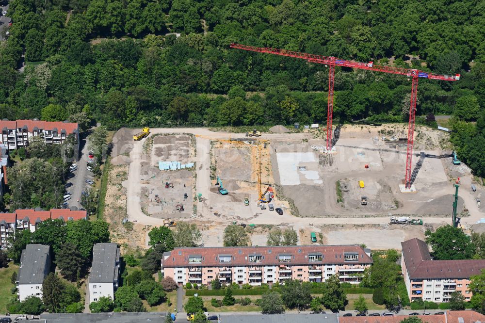 Berlin from the bird's eye view: Construction site to build a new multi-family residential complex on Buschkrugallee in the district Britz in Berlin, Germany