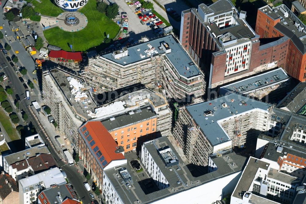 Berlin from the bird's eye view: Construction site to build a new multi-family residential complex Charlie Livin of Trockland Management GmbH along the Zimmerstrasse and Mauerstrasse in the district Mitte in Berlin, Germany