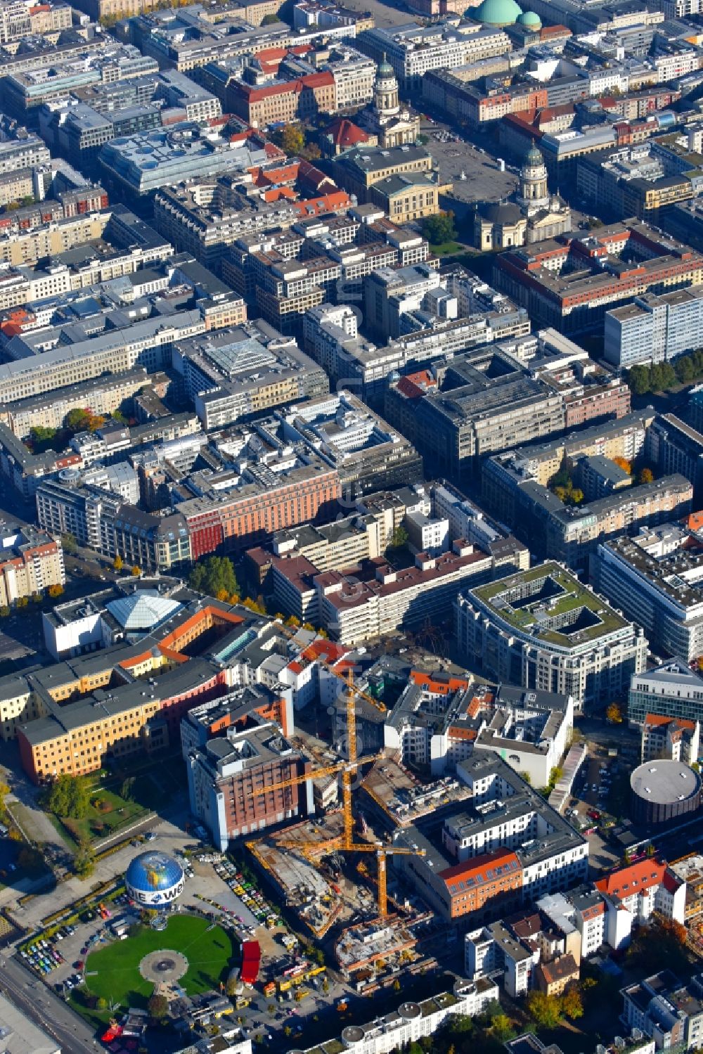 Berlin from the bird's eye view: Construction site to build a new multi-family residential complex Charlie Livin of Trockland Management GmbH along the Zimmerstrasse and Mauerstrasse in the district Mitte in Berlin, Germany