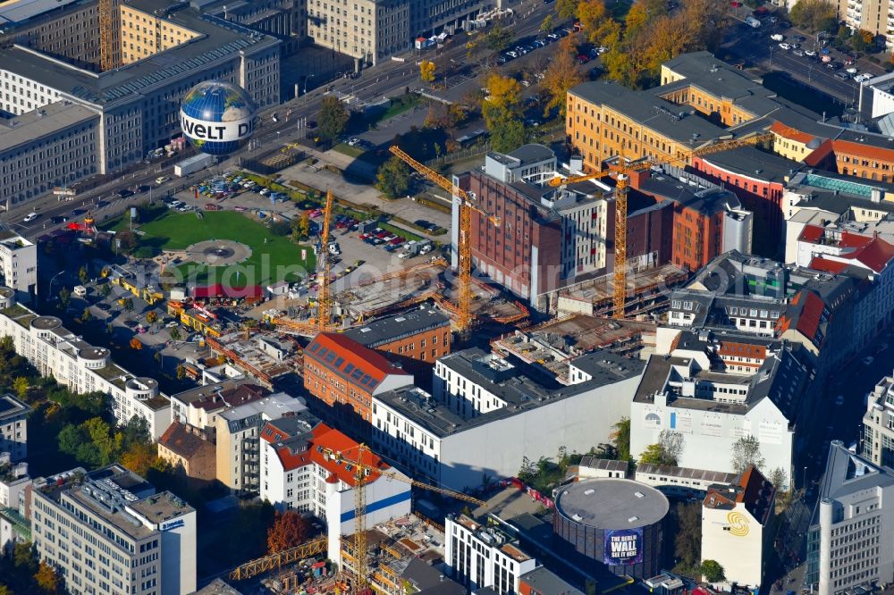 Berlin from the bird's eye view: Construction site to build a new multi-family residential complex Charlie Livin of Trockland Management GmbH along the Zimmerstrasse and Mauerstrasse in the district Mitte in Berlin, Germany