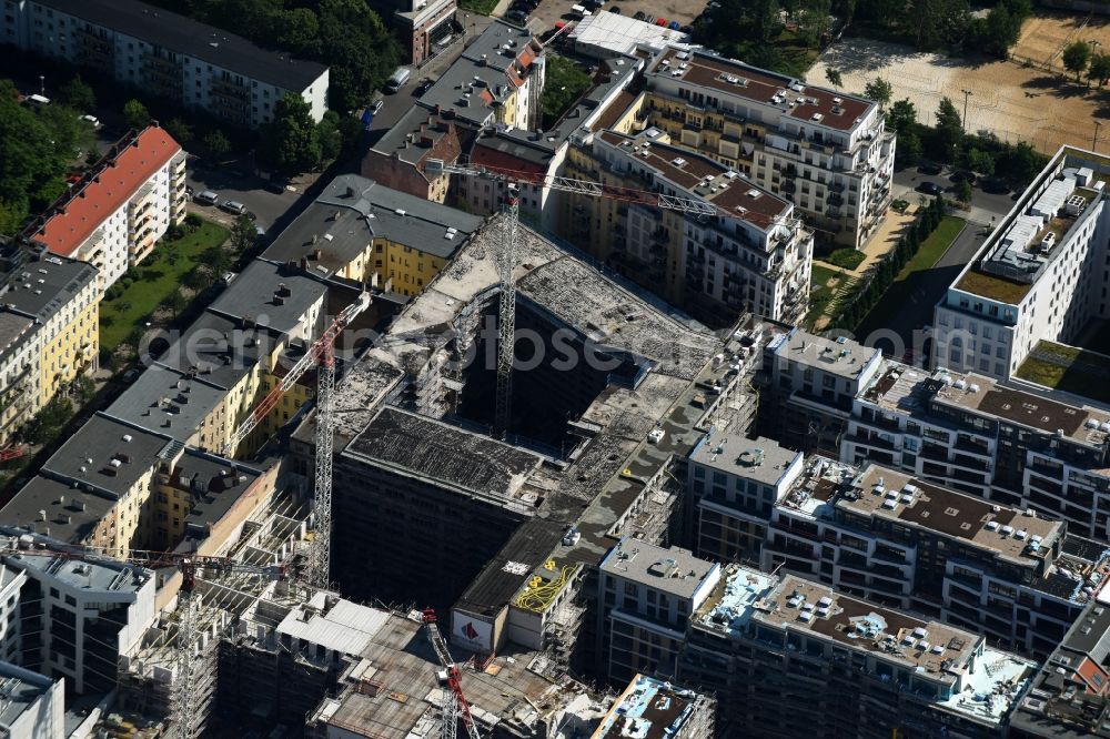 Berlin from above - Construction site to build a new multi-family residential complex Chausseestrasse Ecke Schwartzkopffstrasse destrict Mitte in Berlin