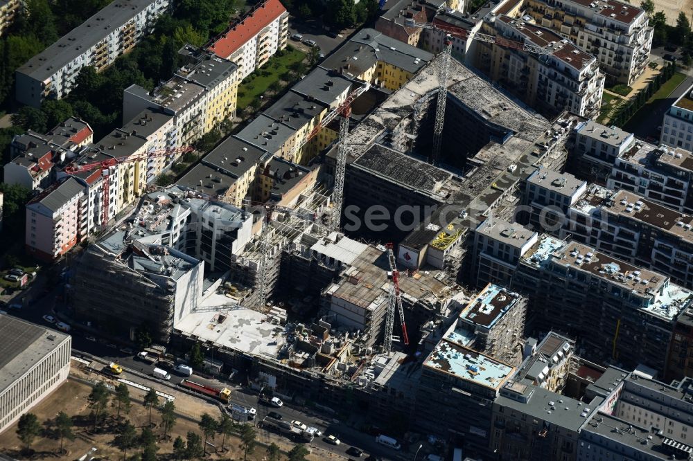 Berlin from the bird's eye view: Construction site to build a new multi-family residential complex Chausseestrasse Ecke Schwartzkopffstrasse destrict Mitte in Berlin