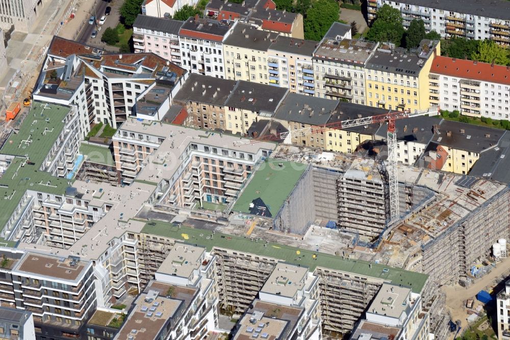 Berlin from above - Construction site to build a new multi-family residential complex Chausseestrasse Ecke Schwartzkopffstrasse destrict Mitte in Berlin