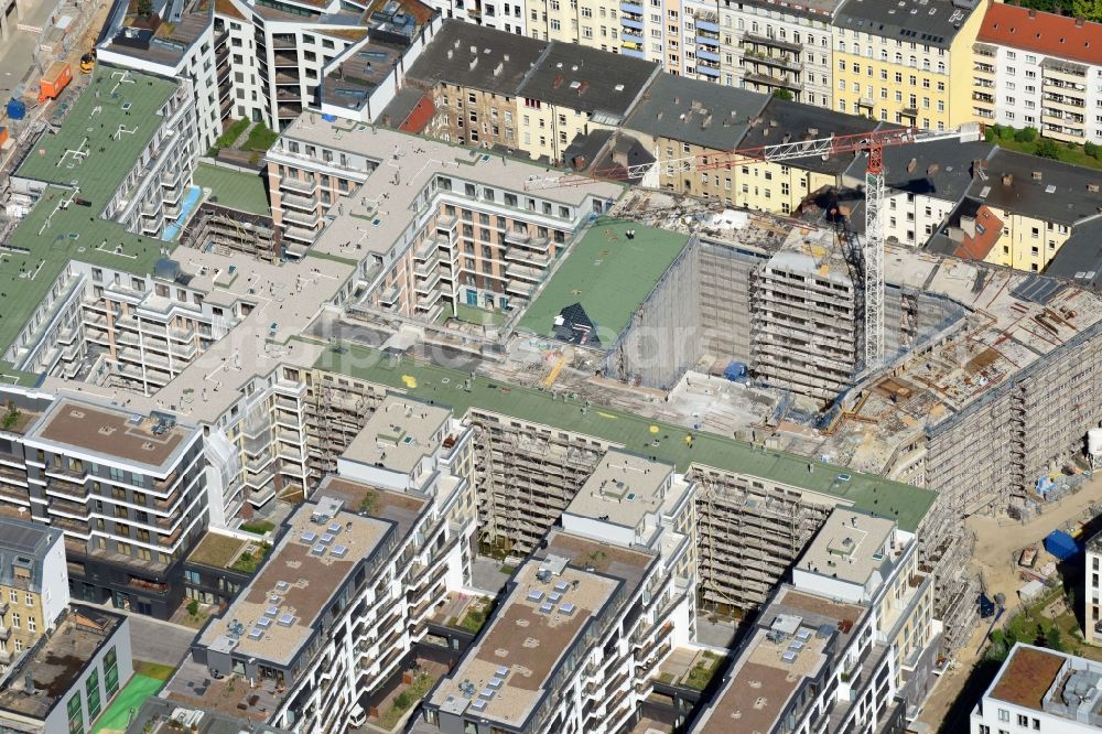 Berlin from the bird's eye view: Construction site to build a new multi-family residential complex Chausseestrasse Ecke Schwartzkopffstrasse destrict Mitte in Berlin